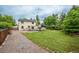 Spacious backyard with green grass and gravel area at 4571 S Memphis St, Aurora, CO 80015