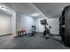 Finished basement featuring exercise equipment at 4571 S Memphis St, Aurora, CO 80015