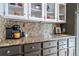 Kitchen featuring granite countertops, a coffee station, and gray shaker cabinets at 4571 S Memphis St, Aurora, CO 80015