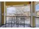 Balcony with seating and view of winter landscape at 6283 Kilmer Loop # 201, Golden, CO 80403