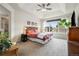 Spacious main bedroom with vaulted ceiling, large window, and ensuite bathroom at 23600 E Swallow Cir, Aurora, CO 80016