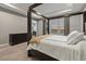 Main bedroom featuring four poster bed, neutral walls, large windows and trey ceiling at 14845 Haley Ave, Parker, CO 80134