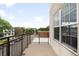 Spacious balcony with views of the city and surrounding greenery at 1780 N Washington St # 305, Denver, CO 80203