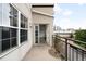 Inviting balcony with open doorway offering city views and natural light at 1780 N Washington St # 305, Denver, CO 80203