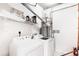 Functional laundry area with washer, dryer, and ample storage space for convenience at 1780 N Washington St # 305, Denver, CO 80203