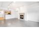 Bright living space open to the kitchen with modern floors and fireplace at 1780 N Washington St # 305, Denver, CO 80203