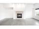 Bright, open living space with modern floors and a beautiful fireplace at 1780 N Washington St # 305, Denver, CO 80203