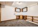Basement bedroom with built-in desk and storage solutions at 2710 Zenobia St, Denver, CO 80212