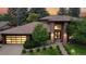 Beautiful brick home with tile roof, landscaped walkway, and inviting front entrance at sunset at 463 Locust St, Denver, CO 80220