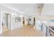 This hallway features hardwood floors, modern art, and railing at 463 Locust St, Denver, CO 80220
