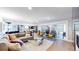 Spacious open floor plan connects the living area to an outdoor patio with ample natural light at 463 Locust St, Denver, CO 80220