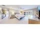 Spacious main bedroom with carpet floors, ceiling fan, and ensuite bath at 463 Locust St, Denver, CO 80220