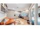 Bright home office with custom built-ins, ample desk space, and cozy seating area at 463 Locust St, Denver, CO 80220