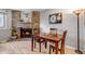 Charming dining area with a fireplace backdrop, perfect for intimate dinners and creating lasting memories with loved ones at 4194 S Fraser Way # B, Aurora, CO 80014