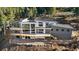 Beautiful home with outdoor decks perfect for enjoying the scenic views and natural surroundings at 13415 S Resort Dr, Conifer, CO 80433