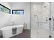 Luxurious bathroom with a freestanding tub and a glass-enclosed shower featuring marble finishes at 13415 S Resort Dr, Conifer, CO 80433