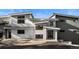 Modern home featuring a combination of white siding, stone accents, and sleek black window frames at 13415 S Resort Dr, Conifer, CO 80433