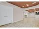 Spacious basement featuring sleek wood floors, wet bar, and neutral color palette for modern style at 247 N Coolidge Way, Aurora, CO 80018