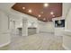 Entertainment basement area featuring a built-in bar, recessed lighting, and a unique ceiling design at 247 N Coolidge Way, Aurora, CO 80018