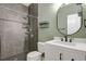 Updated bathroom with modern fixtures, tiled shower, and stylish vanity at 247 N Coolidge Way, Aurora, CO 80018