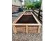 Newly installed raised garden beds are ready for your green thumb to plant a garden at 247 N Coolidge Way, Aurora, CO 80018