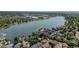 Aerial view of lakeside condo community with lake access, lush landscaping and mature trees at 6861 Xavier Cir # 3, Westminster, CO 80030