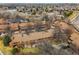 Overhead shot of townhouses near a lake with tree coverage at 2263 E 129Th Ave, Thornton, CO 80241