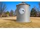 Decorative silo landmark with Eastlake Heritage Trail sign in a well-maintained community park setting at 2263 E 129Th Ave, Thornton, CO 80241