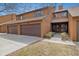 Attractive townhome featuring a spacious two-car garage, tidy landscaping, and welcoming front door at 2263 E 129Th Ave, Thornton, CO 80241