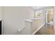 Hallway with natural light, showcasing the home's neutral color palette at 2263 E 129Th Ave, Thornton, CO 80241