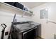 Functional laundry room with modern washer and dryer units at 2263 E 129Th Ave, Thornton, CO 80241