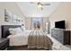 Inviting main bedroom with neutral tones, featuring a ceiling fan and natural light at 2263 E 129Th Ave, Thornton, CO 80241