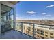 Balcony with city and lake views, glass railings, and outdoor space for relaxation and enjoying the scenery at 4200 W 17Th Ave # 1013, Denver, CO 80204