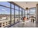 Bright and spacious room with floor-to-ceiling windows offering expansive city views and natural light at 4200 W 17Th Ave # 1013, Denver, CO 80204