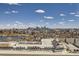 Panoramic city view featuring a lake, buildings, and sky, illustrating urban beauty and natural surroundings at 4200 W 17Th Ave # 1013, Denver, CO 80204