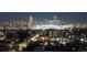 Night view of a vibrant city skyline illuminated with lights, showcasing urban living and architectural grandeur at 4200 W 17Th Ave # 1013, Denver, CO 80204