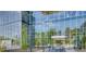 Exterior view of Lakehouse retail with glass architecture, landscaping, and available restaurant/retail space at 4200 W 17Th Ave # 1013, Denver, CO 80204
