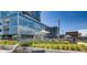 Relaxing rooftop lounge with lounge chairs, umbrellas, and colorful flowers, perfect for upscale outdoor living at 4200 W 17Th Ave # 1013, Denver, CO 80204