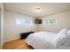 Bright bedroom with hardwood floors and a clean, minimalist style at 10500 Marion St, Northglenn, CO 80233