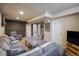 Basement living room with a couch and carpet flooring at 10500 Marion St, Northglenn, CO 80233