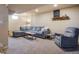 Basement living room with a couch and carpet flooring at 10500 Marion St, Northglenn, CO 80233
