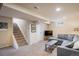 Basement living room with a couch and carpet flooring at 10500 Marion St, Northglenn, CO 80233