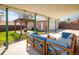 Inviting patio area with a pergola, comfortable seating, and string lights for outdoor enjoyment at 10500 Marion St, Northglenn, CO 80233