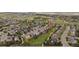 Aerial view of a home with manicured lawn in a residential neighborhood and close proximity to a green space at 4915 Parsons Way, Castle Rock, CO 80104