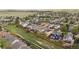 Aerial view of the property nestled in a well-maintained neighborhood with mature trees at 4915 Parsons Way, Castle Rock, CO 80104