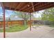 A backyard featuring a hammock strung under a covered patio with string lights at 4915 Parsons Way, Castle Rock, CO 80104