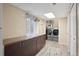 Well-organized laundry room with a folding counter, cabinets, and modern washer/dryer at 4915 Parsons Way, Castle Rock, CO 80104