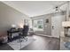 Bright office space near front door featuring modern lighting and large window views at 4915 Parsons Way, Castle Rock, CO 80104