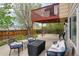 Inviting patio with comfortable seating and fire pit, perfect for entertaining at 4915 Parsons Way, Castle Rock, CO 80104