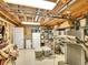 Unfinished basement with exposed ceiling offers ample storage or workshop space at 3481 S Race St, Englewood, CO 80113